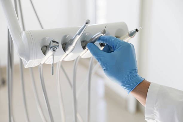 Professional Tooth Extraction technician working in St. Hedwig, TX
